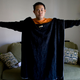 Image for article titled Ultimate Battle: The Snuggie vs. Slanket vs. Freedom Blanket vs. Blankoat